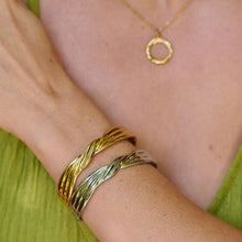 Load image into Gallery viewer, Ava &amp; Sky Stainless Steel Gold Plated Twised Ribbon Bangle (Copy)
