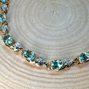 Pre-Loved 9ct Yellow and White Gold Blue Topaz and Diamond Bracelet