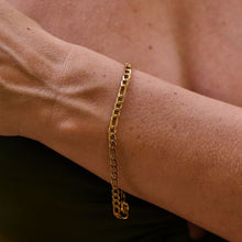 Load image into Gallery viewer, Ava &amp; Sky Stainless Steel Gold Plated Figaro Bracelet
