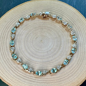 Pre-Loved 9ct Yellow and White Gold Blue Topaz and Diamond Bracelet