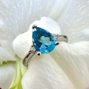 White Gold Pear Shaped Blue Topaz & Diamond Ring