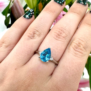 White Gold Pear Shaped Blue Topaz & Diamond Ring