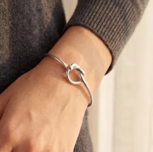 Load image into Gallery viewer, Silver Love-Knot Tension Clik Bangle
