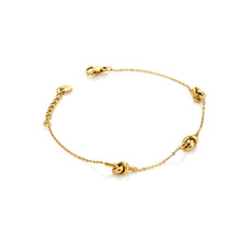Load image into Gallery viewer, Ava &amp; Sky Stainless Steel Gold Plated Knot Bracelet
