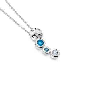 Sterling Silver Pebble Pendant Set With Topaz