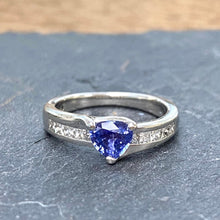 Load image into Gallery viewer, Pre-Loved Platinum Ring with a Trillion Cut Ceylon Sapphire and Diamonds

