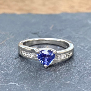 Pre-Loved Platinum Ring with a Trillion Cut Ceylon Sapphire and Diamonds