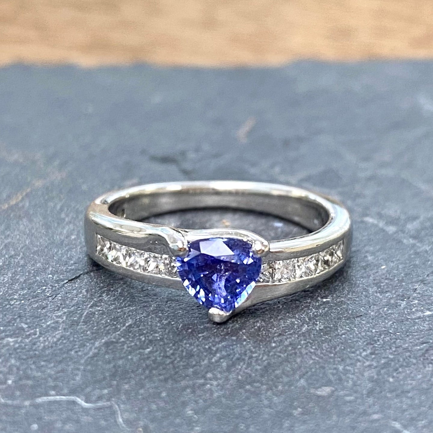 Pre-Loved Platinum Ring with a Trillion Cut Ceylon Sapphire and Diamonds